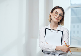 pretty business woman in white shirt office documents professional