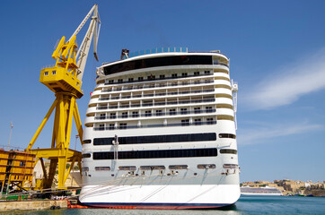 Dry Dock maintenance work on luxury MSC cruiseships Divina and cruise ship liner Magnifica at pier...