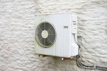 Condenser unit for air conditioning system wall mounted outdoors