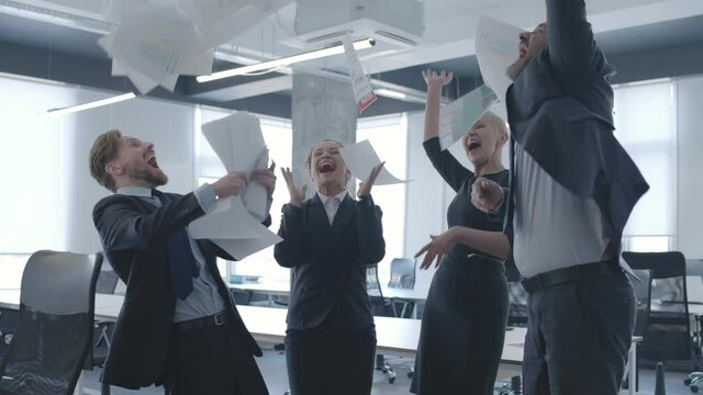 Successful Businesspeople Throwing Papers In Air Slow-mo, Happy With Victory