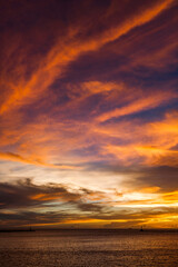 Fototapeta na wymiar Colorful beautiful sunset with the orange cloud background
