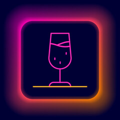 Glowing neon line Wine glass icon isolated on black background. Wineglass sign. Colorful outline concept. Vector