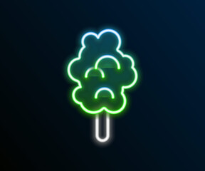 Glowing neon line Cotton candy icon isolated on black background. Colorful outline concept. Vector