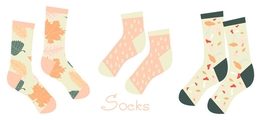 Trendy socks with pattern of fall leaves, mushrooms, raindrops. Pastel colors. Contemporary clothing items. Vector