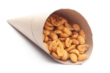 Close-up of Heeng jeera Peanuts mixture Indian namkeen (snacks) In handmade ( handcraft ) brown paper cone bag over white background.