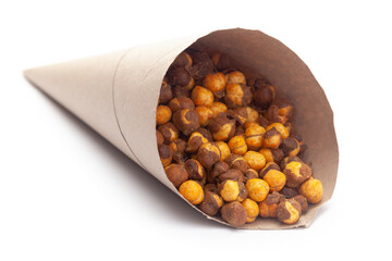 Close-Up of Crunchy Roasted Chana Masala In handmade ( handcraft ) brown paper cone bag, made with Bengal Grams or Chickpeas. Indian spicy snacks (Namkeen),