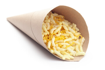 Close-Up of Crunchy Lemon Bhel In handmade ( handcraft ) brown paper cone bag made with Puffed Rice small besan sev. Indian spicy snacks (Namkeen),