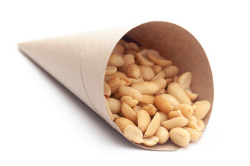 Close up of crunchy roasted Peanuts Indian namkeen (snacks) In handmade ( handcraft ) brown paper cone bag