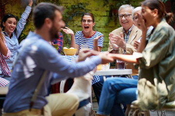 thrilled people witnessing proposal. selective focus