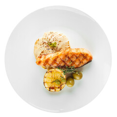 Isolated plate of gourmet grilled salmon fillet fish