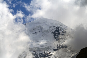 Caucasus, Ossetia. Tsata gorge. Summit Shau in the clouds. 