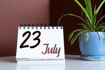 July 23. 23th day of the month, calendar date. Summer month, day of the year concept.