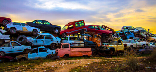  Pile of discarded cars on junkyard - obrazy, fototapety, plakaty