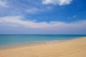 Fototapeta na wymiar Beautiful tropical beach and bright blue sky. Summertime for a holiday