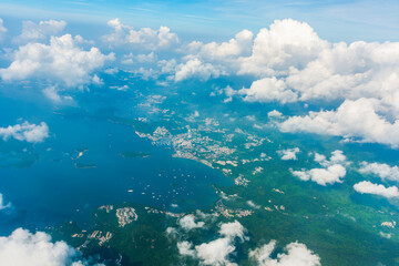 Fototapeta na wymiar A bird's-eye view of the landforms of Hong Kong in China from the airplane window