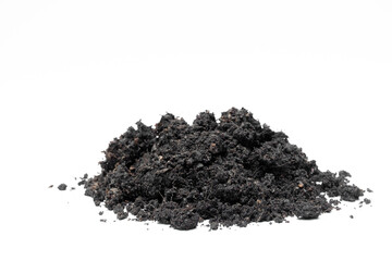 A mound of fertile black soil for cultivating plants.