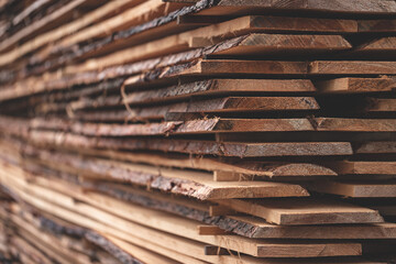 Detail of wooden planks. Wooden pallets. Wood. Lumber. A stack of new wooden planks in the lumber...