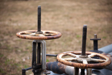 Valves on pipes. Hot water supply. Pipes with pressure regulators.