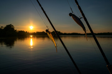 Fishing baits in the lake sunset scenery