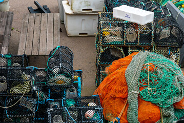Fishing nets and crab pods on the docks.