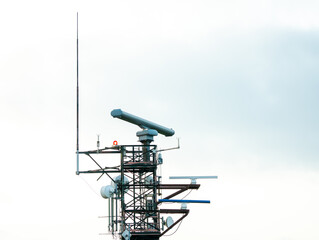 Large military of coast guard radar antenna and communications tower.