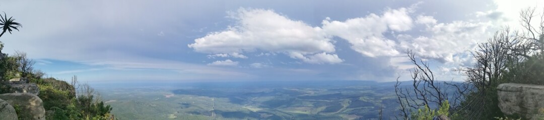 Green valley blue sky gods window Lush greenery clouds