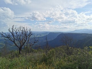 Green valley blue sky gods window Lush greenery clouds