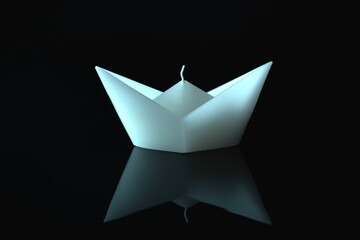 A white boat on a black background with a reflection. Minimalistic picture.