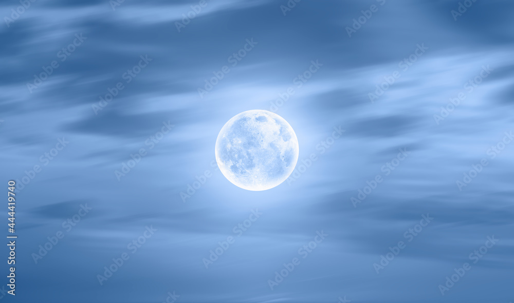 Poster night sky with moon in the clouds on the foreground calm sea