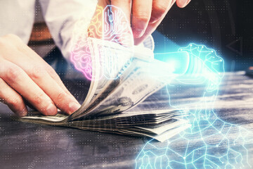 Fototapeta premium Multi exposure of vr glasses drawing hologram and USA dollars bills and man hands.