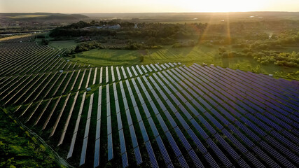 Ecology solar power station panels in the fields green energy at sunset landscape electrical innovation nature environment