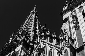 Black and white photo of old catholic church. Cathedral in black and white colours in sunny day. Cathedral in black and white close up. Saint Nicholas Cathedral