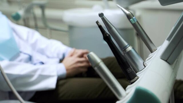 Close up of dental tools for hygienic cleaning and treatment of teeth. Preparation of medical equipment for high-quality work of the dentist. Concept of healthy and clean teeth