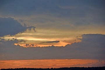 Red sunset with blue clouds in the evening