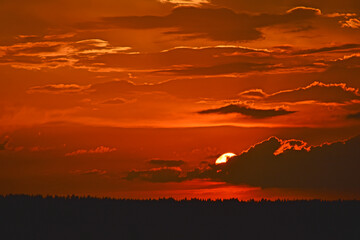 Red sunset with clouds in the evening