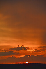 Red sunset with clouds in the evening