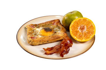 Modern breakfast, toasted bread, eggs, bacon, orange in ceramic plate  on isolated white background. Good healthy food.