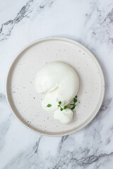 Burrata - Italian fresh cheese made from cream
