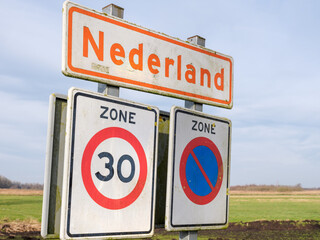 Oranje plaatsnaambord Nederland van het dorp Nederland in Steenwijkerland || Orange place name sign Netherlands of the village of the Netherlands in Steenwijkerland