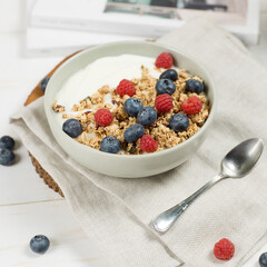 Healthy cereals with blue berry and yogurt