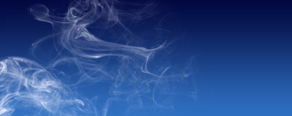 White smoke on blue gradient background