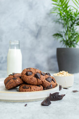 Double Chocolate oats Cookies - Styled with a bottle of milk and oats and chocolate - healthy cookies