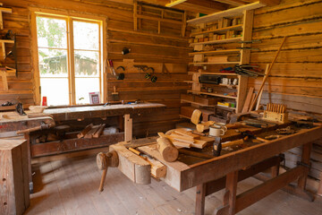 Obraz na płótnie Canvas vintage woodworking tools in wood room. Carpentry. carpenter's workbench