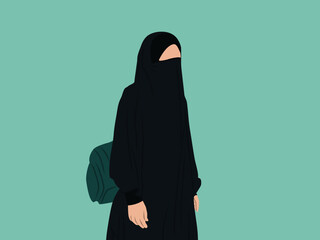 A woman wearing a green burqa bearing a bag