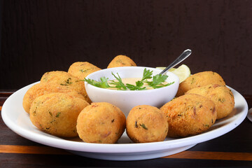 fried dumpling, cod dumpling, fish meat, local focus
salted cod fritters, bacalao bunuelos