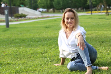 person sitting on the grass