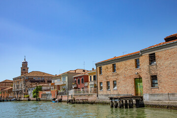 Fototapeta na wymiar panoramic view to canal in Murano, the island of venice with historic glass blowing industry