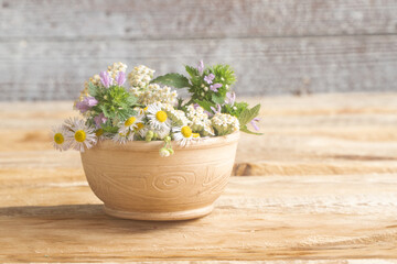 happy birthday greeting card. wildflowers in clay vase. valentine's day