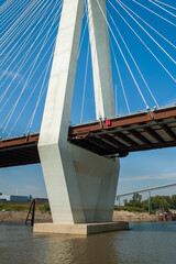 The detail of a cable-stayed bridge construction.  Stan Musial Veterans Memorial Bridge on the Mississippi river at St Louis - obrazy, fototapety, plakaty