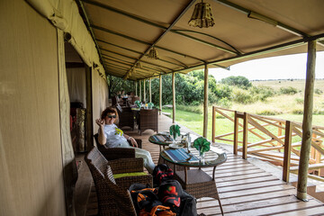 woman tourist in national park on safari 